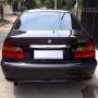 Jual BMW 318i th 2002 Facelift 2000cc, Triptonic, hitam metalik.
