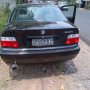 Dijual BMW 318i 1997 MT black plat B