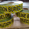 warning tape caution buried electric line below aluminium,detectable under ground